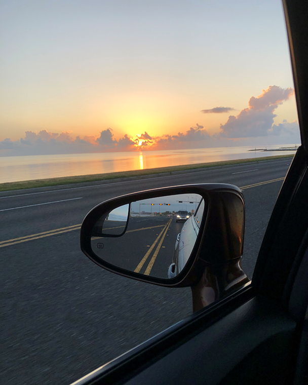 First Person Point View Sunset Car Mirror Road Trip Stock Photo by  ©Vera_Petrunina 222768754
