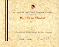 A certificate from The League of United Latin American Citizens, awarding the Key Man Award to Arturo Vasquez for outstanding services during the year 1954-1955.