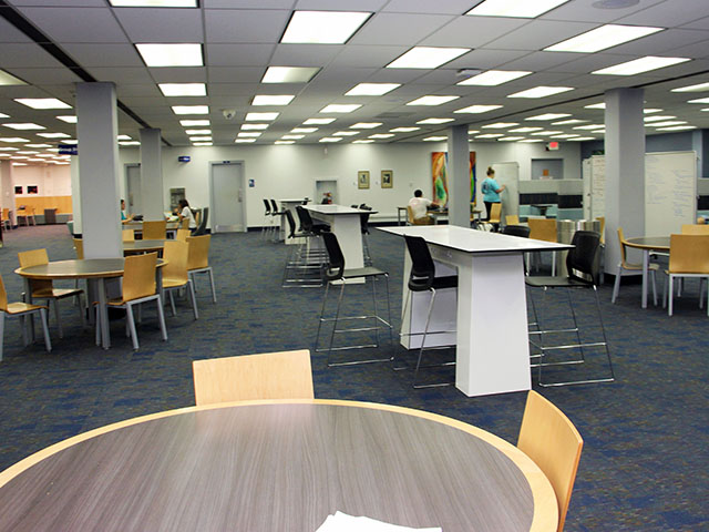 tables and seating of various types and sizes through the 2nd floor of the library